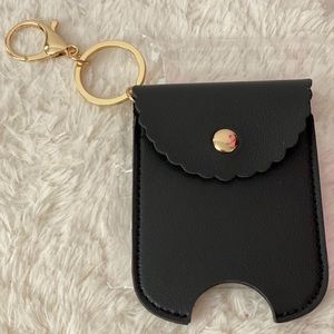 Hand sanitizer holder